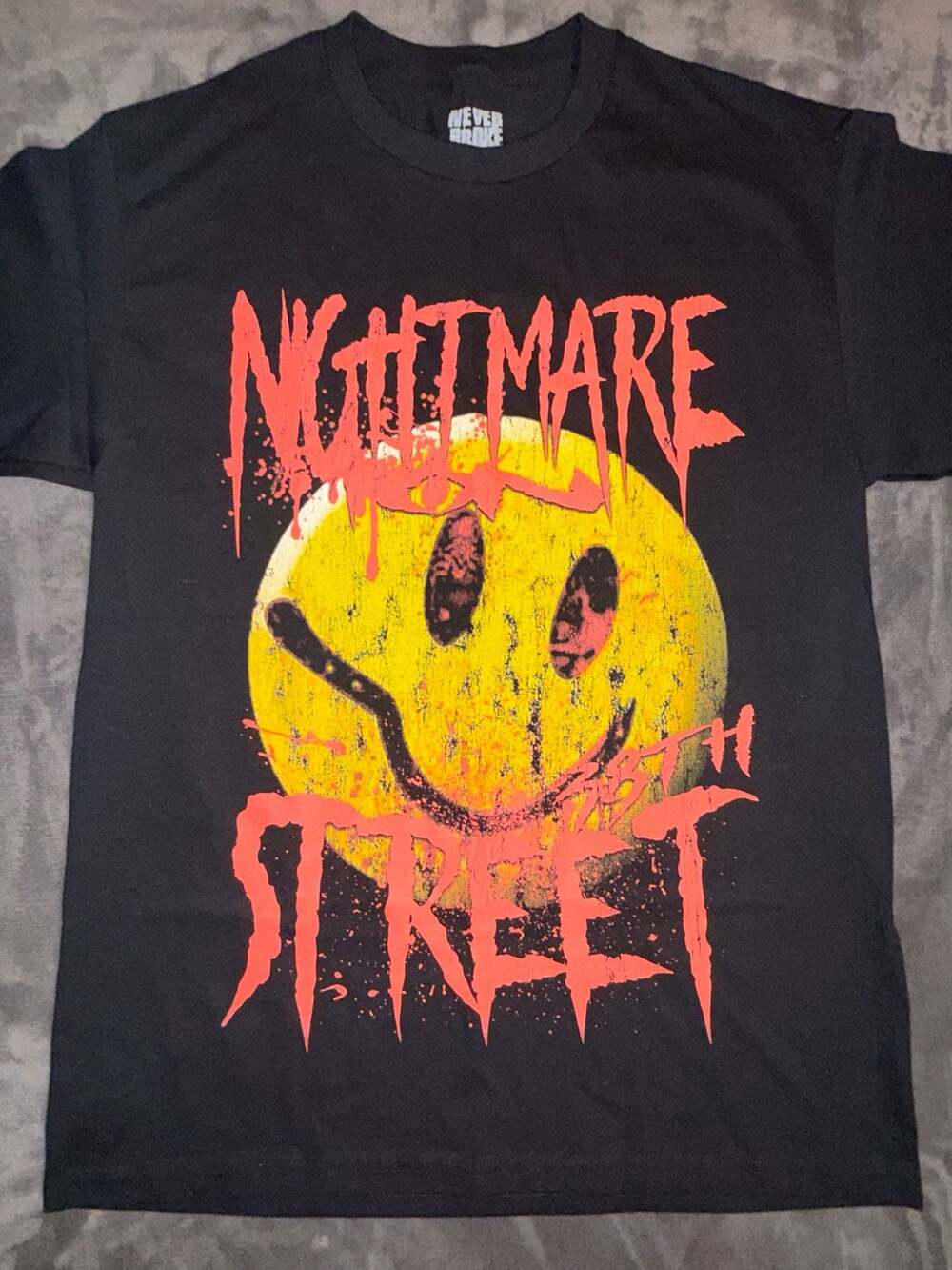 Never Broke Again Nightmare Street Smiley Face Black Graphic T-Shirt Large